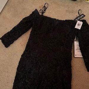 Never worn .. got it has a gift. Someone please buy this asap
